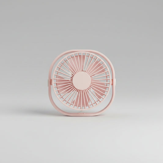 Pink portable fan on a wooden surface with text highlighting its adjustable feature.