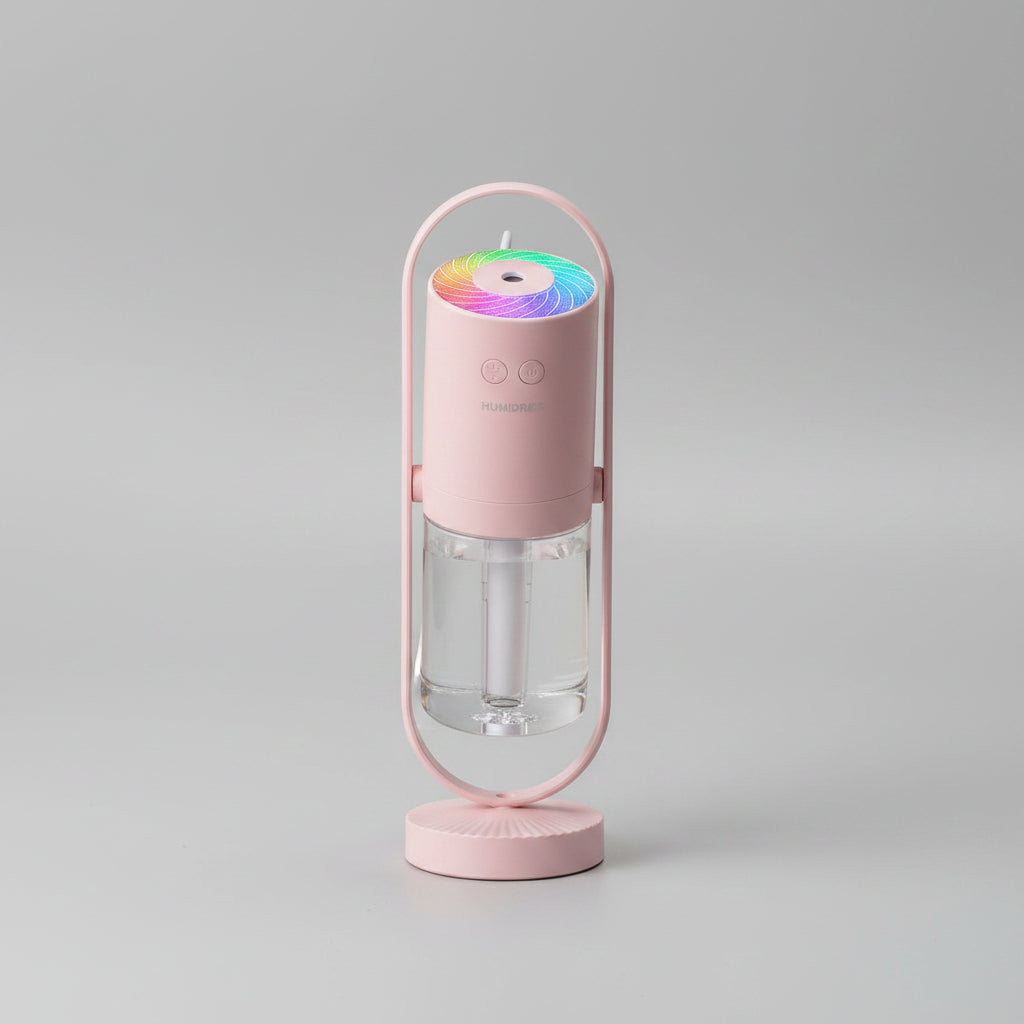 Pink humidifier on a wooden surface with text about relaxing and relieving dryness.