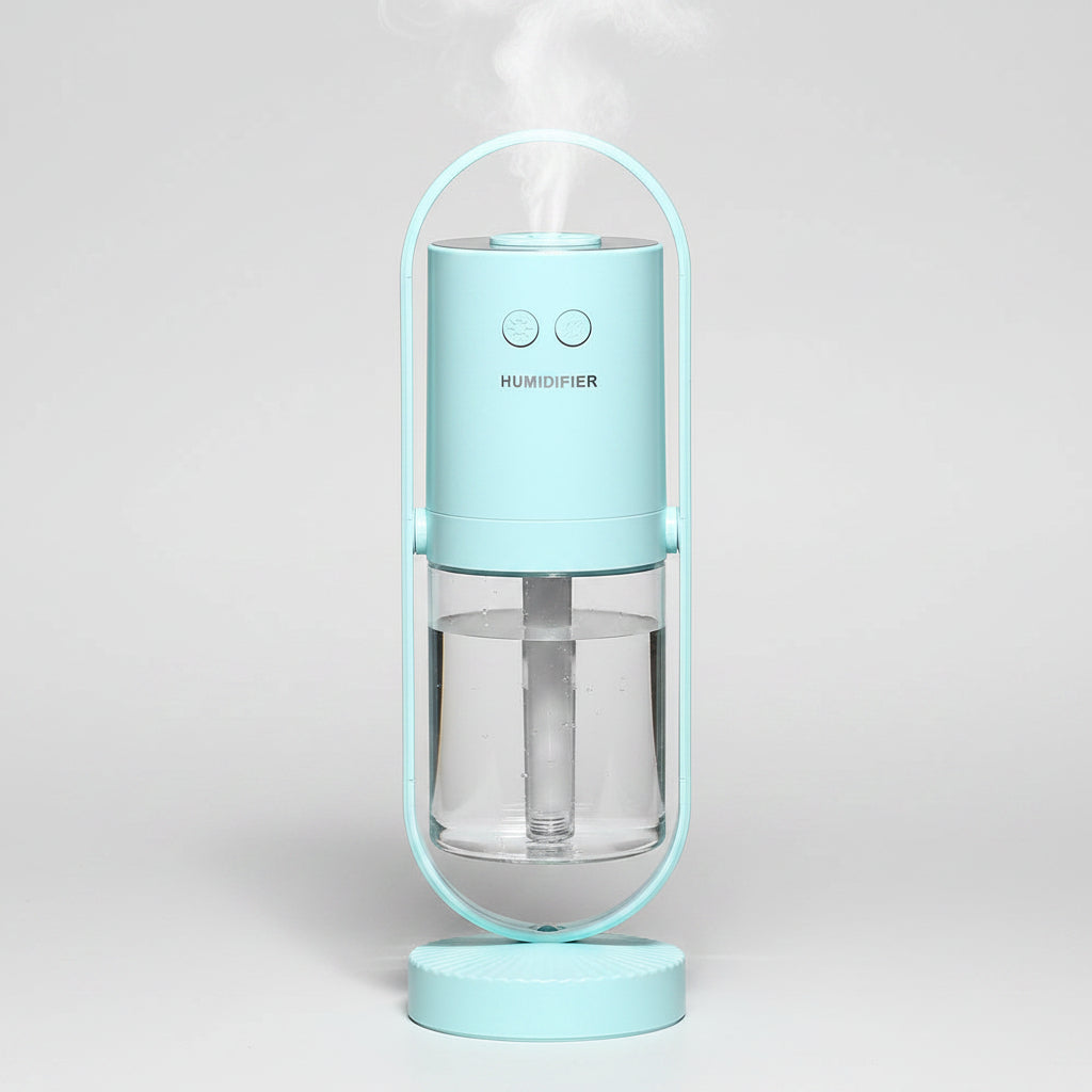 Portable humidifier with a light blue top and base on a white background