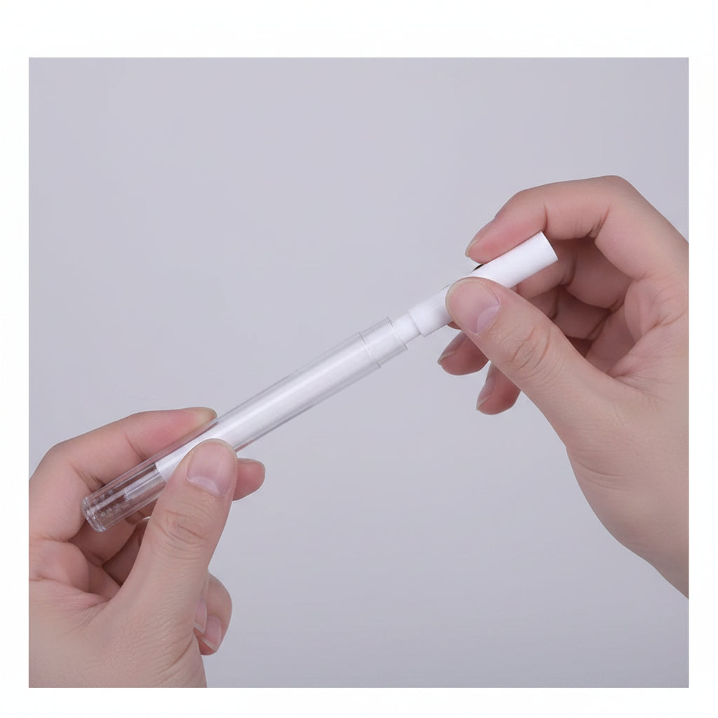 Two hands holding a white pen against a light gray background with 'X10' text.
